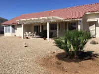Newly Renovated Vacation Home With Desert Theme in Premier Golf Community