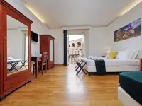 Romulus Rooms by Hostand Hoteles cerca de Grandes Almacenes La Rinascente