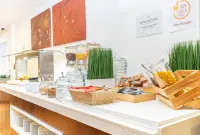 假日中心公寓酒店 - 早餐