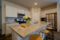 Comfortable Midterm 4BR in Manor Near Tesla & Samsung Furnished + Flexible Stays Hotels in Manor