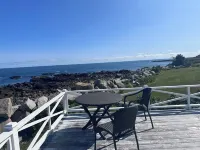 Charming oceanfront retreat, where time slows down and memories are made.