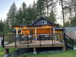 Fun cottage with hot tub, pool table, game room, and a huge deck.