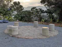 Cozy 2-bedroom cabin in Wayanad, built sustainably amidst lush greener