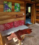 Ecolodge on 25 acre estate, 2 beaches, wide variety of fruit and flowers. Hotels in Calibishie