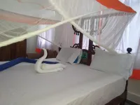 Cozy Paje Apartment with Garden View, Perfect for Couples and Solo Travelers