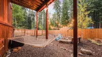 Outdoor Dining, Backyard & Trails Nearby Cedar Hollow Retreat by Avantstay