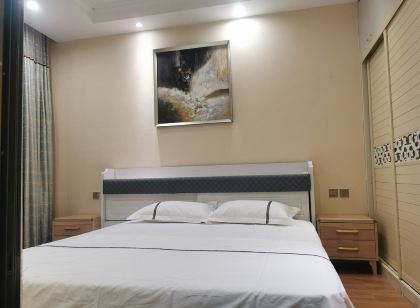 版納肖公寓（瀾滄江黎明大橋分店）