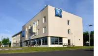 ibis budget Caen Porte de Bretagne Отели в г. 