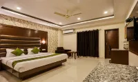 Treebo Grand Legacy Elite with Roof Top Cafe Hotels near ShivPuri Mata Mandir