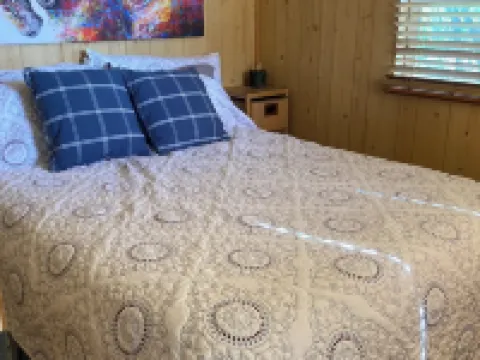 Located Behind a Tree Filled Garden Near Our Horse Barn and Farm Sanctuary. Hotels in Swan Township