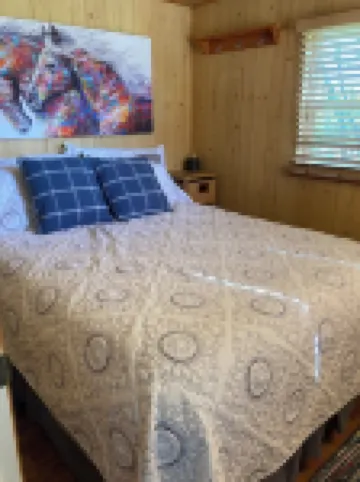 Located Behind a Tree Filled Garden Near Our Horse Barn and Farm Sanctuary.