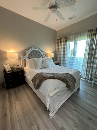 Walk to the beach.  2 Bedroom Condo - "The Blue Palm