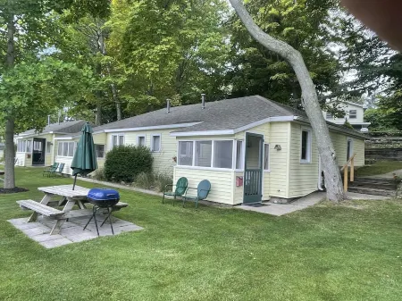 Cottage 2 is a 2 bedroom 25’ from its boat dock & Hamlin Lake