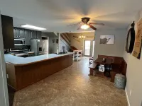 Large house surrounded by farm land along the Republican River.