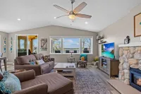 Cozy, year-round lake home with magnificent sunset views, lake access and dock.