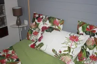 Charm and comfort on the outskirts of town, close to hiking trails.