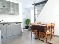 Duplex overlooking the port in the heart of the city.