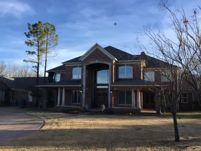 Beautiful 10 acre wooded estate with 4 bedrooms, 4 1/2 baths & private pool.