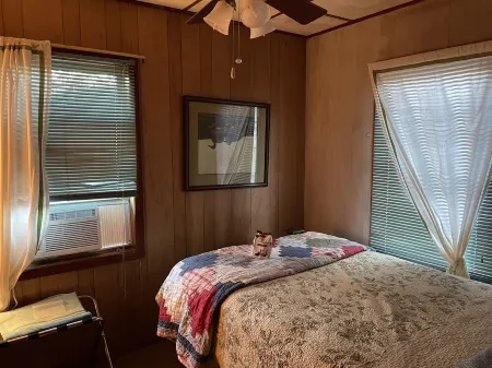 Take a break and unwind on our waterfront screened in porch