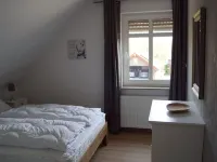 North Sea coast, charming Frisian house with fireplace, conservatory, sauna, beach chair Hotels in Horumersiel
