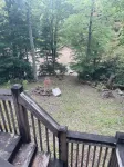 Cozy cabin for 4, 2 King size beds.  Porch with view of lake. Full kitchen.