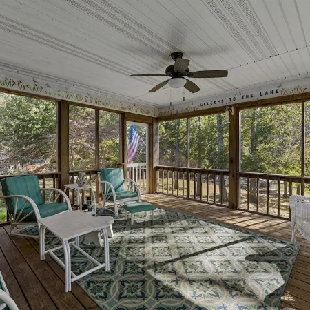 3 bedroom/2 full bath lakefront home with gentle slope to private covered dock