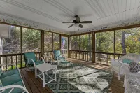 3 bedroom/2 full bath lakefront home with gentle slope to private covered dock