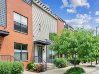 Luxury condo. 2 car garage, rooftop patio. Perfect for work or play!