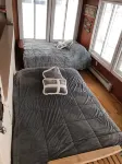 Winnipesaukee lakefront house includes slip, deck, hot tub & sleeps up to 11