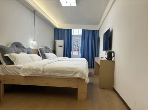 Xingxing Xingyue Chinese Inn (Guxin Street)