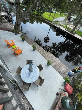 Relax on the beautiful Weeki Wachee River at the charming Seahorse River House!