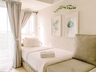 Simple and Cozy Living Studio Room at Poris 88 Apartment