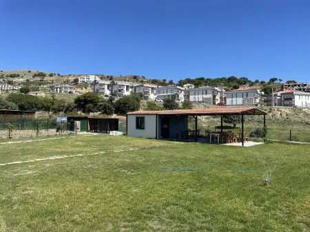 Parli Hotel Отели в г. Гёкчеада