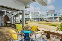 Walk to the beach or pool in this cozy villa. 2 deck spaces with 2 golf carts for enjoyment