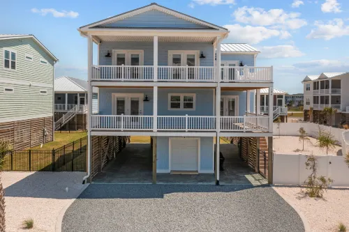 Luxurious Amenities and Steps to the Shoreline - Elegant Coastal Retreat