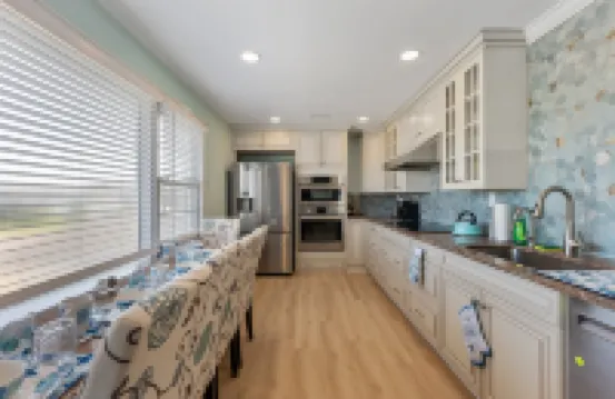 Modern Kitchen and Outdoor Patio with Grill - Stunning Seaside Escape