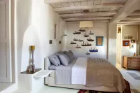 Tinos E Houses