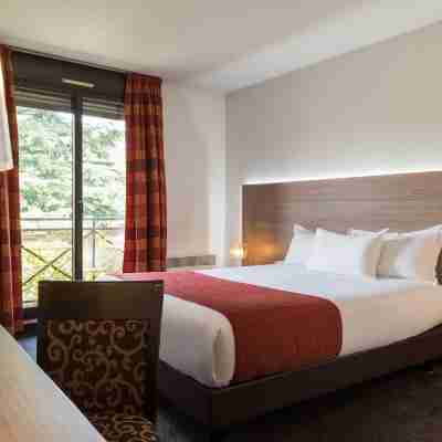 Hôtel Les Amandiers Rooms