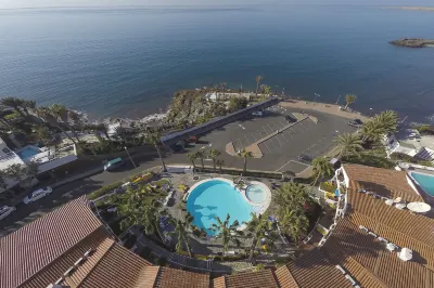 Sunsuites Carolina Hotels in San Agustín