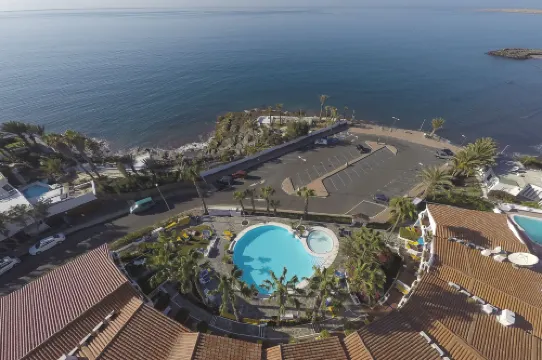 Sunsuites Carolina Hotels in San Agustin