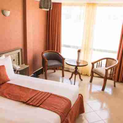 Astorian Grand Hotel Rooms