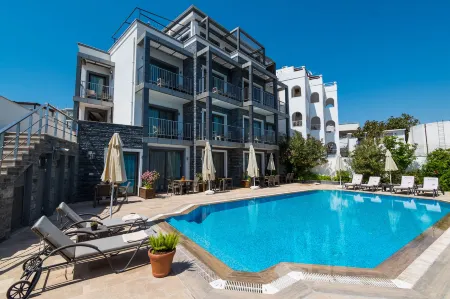 M Suite Отели в г. Gumbet