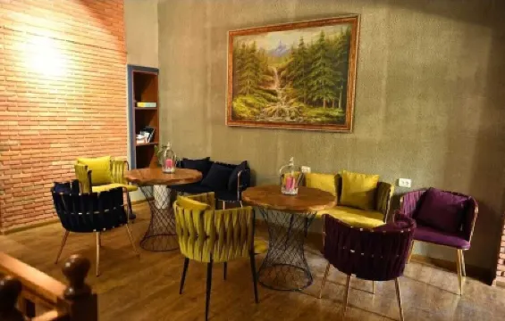 CapsulePlus Отели рядом с достопримечательностью «Дом Юстиции»