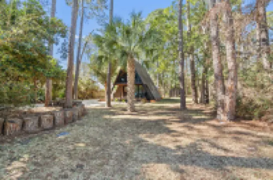 Cozy Cabin with Hot Tub and Fire Pit - Unique Coastal Retreat