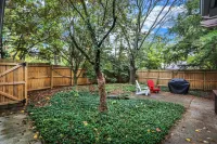 Cozy Fenced Yard and Well-Appointed Kitchen - Inviting Spacious Retreat
