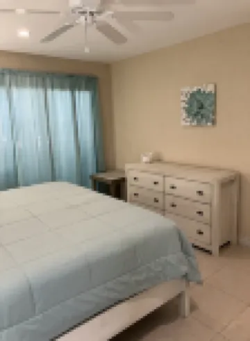 The Harvey Nicole: Modern Caribbean Ocean Front Condo Grand Cayman.