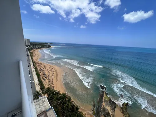 Luquillo Oceanfront Balcony Suite Near El Yunque with Private Beach Access