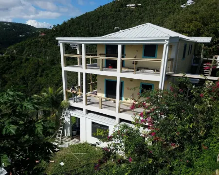 Verandah-style Living Overlooking Coral Bay Hotels in Central