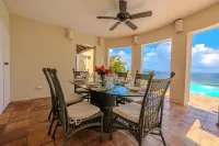 Exceptional design, spacious covered decks, super views, set in Long Bay Estate