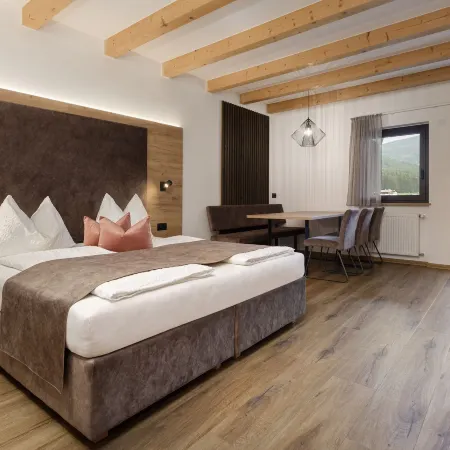 Aparthotel Familiaris - Family Apartments - Pools & Spa in Dolomites